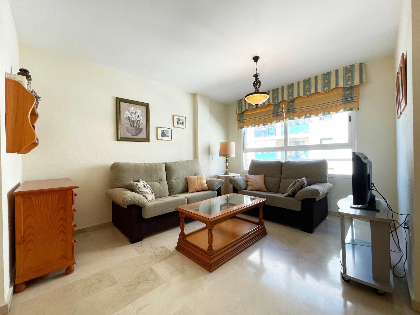 Sala d'estar de Apartament en venda en Nerja amb Aire condicionat, Terrassa i Balcó