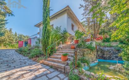 Exterior view of House or chalet for sale in Tres Cantos  with Heating, Private garden and Terrace