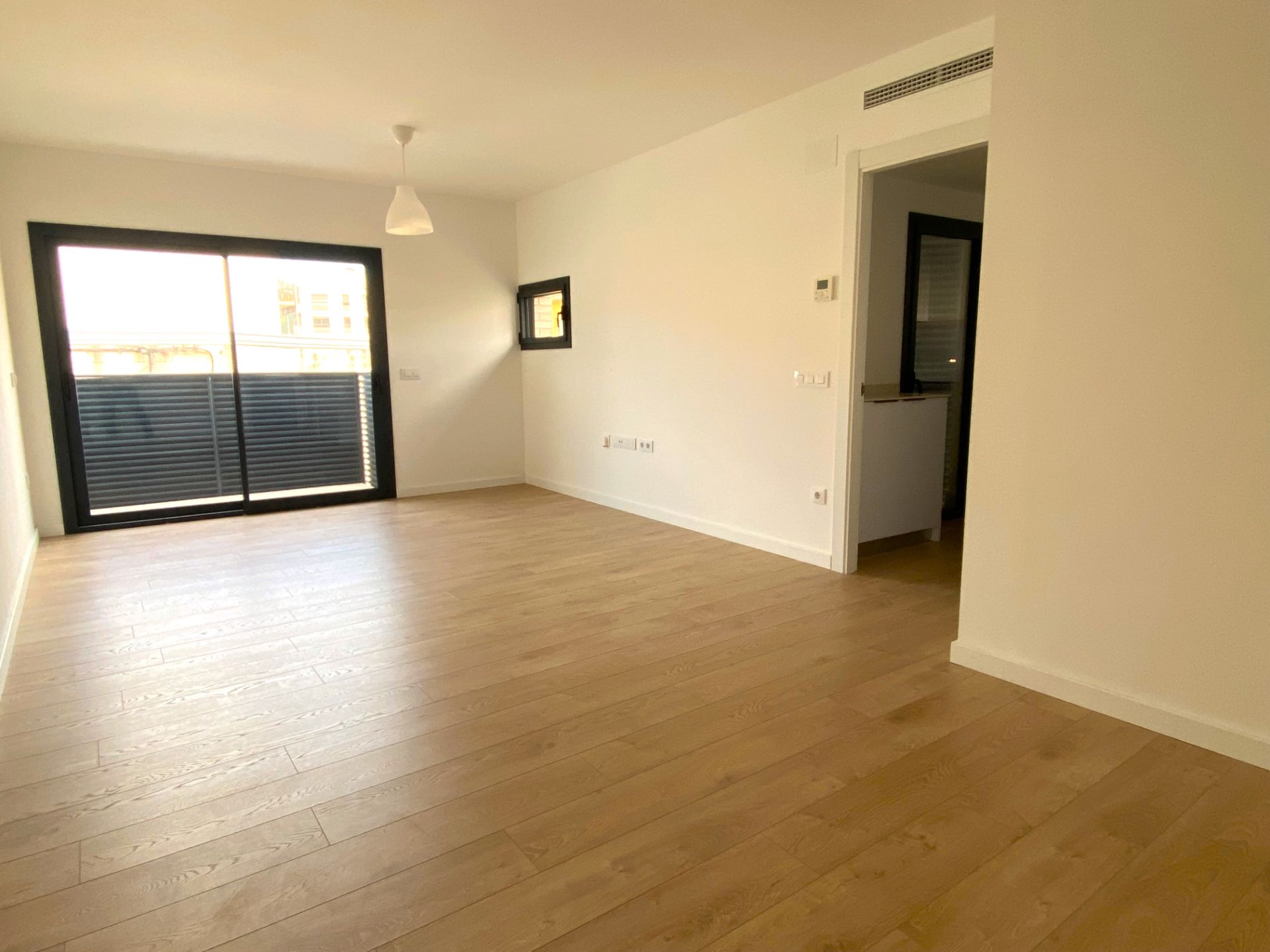 Sala d'estar de Pis de lloguer en Sarrià de Ter amb Aire condicionat, Calefacció i Balcó