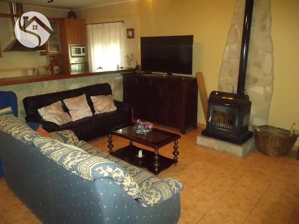 Sala d'estar de Casa adosada en venda en Villar de Olalla
