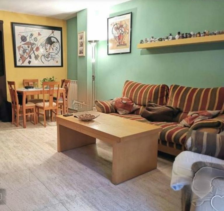 Sala d'estar de Casa adosada en venda en Zuera amb Aire condicionat, Calefacció i Jardí privat