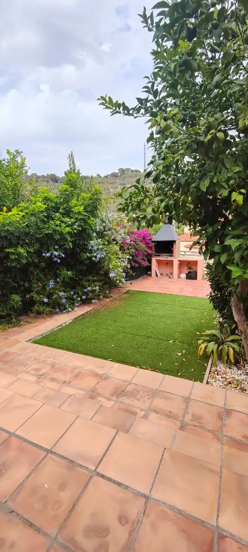 Adossat amb jardí en venda a Segur de Calafell