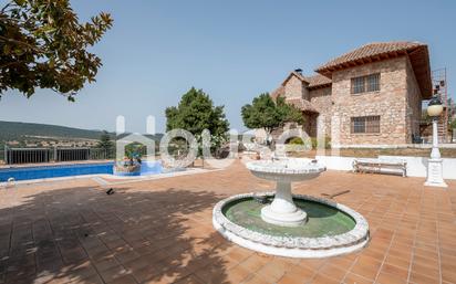 Exterior view of House or chalet for sale in Manzanares El Real  with Terrace and Swimming Pool