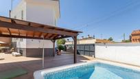 Piscina de Casa adosada en venda en  Granada Capital amb Aire condicionat, Calefacció i Jardí privat