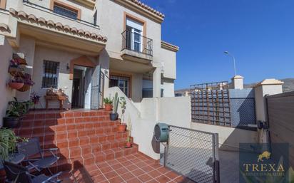 Exterior view of Single-family semi-detached for sale in  Almería Capital  with Air Conditioner, Terrace and Balcony