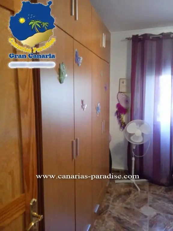 Schlafzimmer von Einfamilien-Reihenhaus zum Verkauf in Mogán mit Klimaanlage, Privatgarten und Möbliert