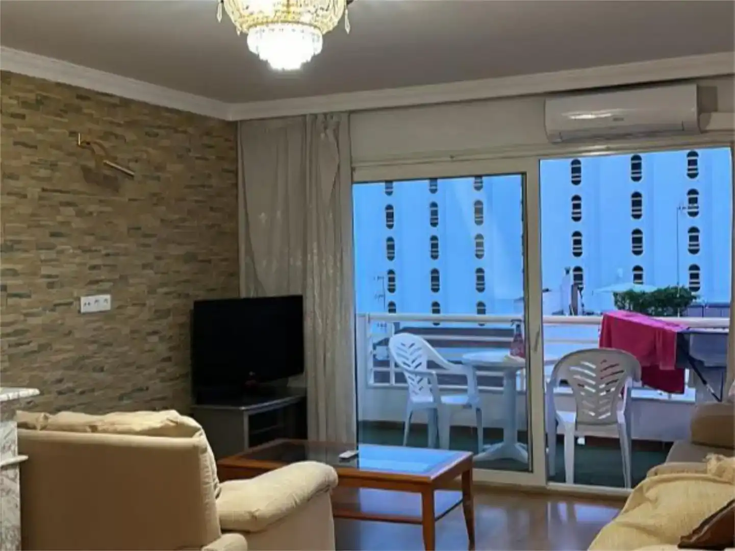 Wohnzimmer von Wohnung zur Miete in Santa Eulària des Riu mit Klimaanlage und Balkon