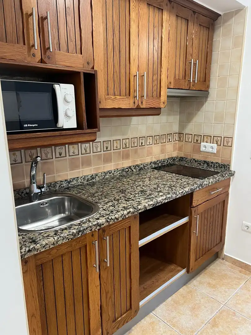 Cuina de Apartament en venda en Benalmádena amb Terrassa i Piscina comunitària