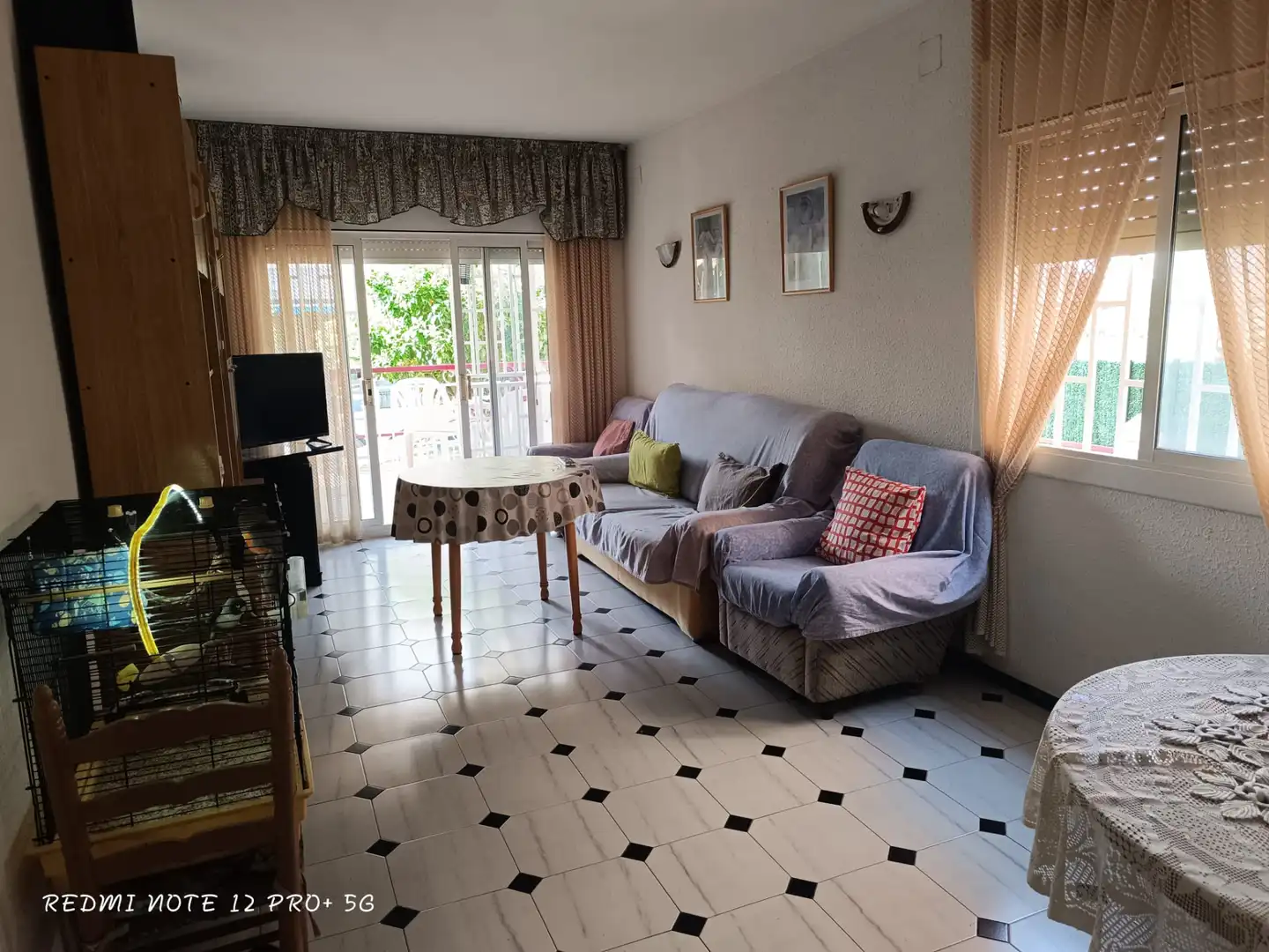 Wohnzimmer von Wohnung zum Verkauf in Cunit mit Privatgarten, Terrasse und Ofen