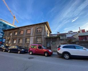 Vista exterior de Casa adosada en venda en Langreo amb Jardí privat