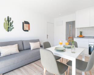 Sala d'estar de Apartament en venda en Santa Pola amb Aire condicionat, Jardí privat i Moblat