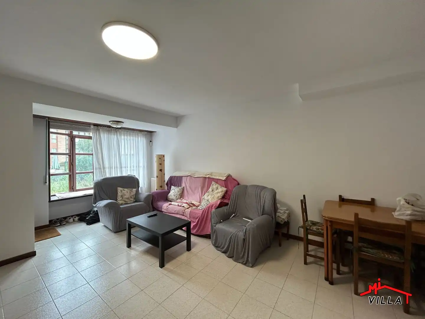 Sala d'estar de Casa adosada en venda en Laredo amb Calefacció i Terrassa