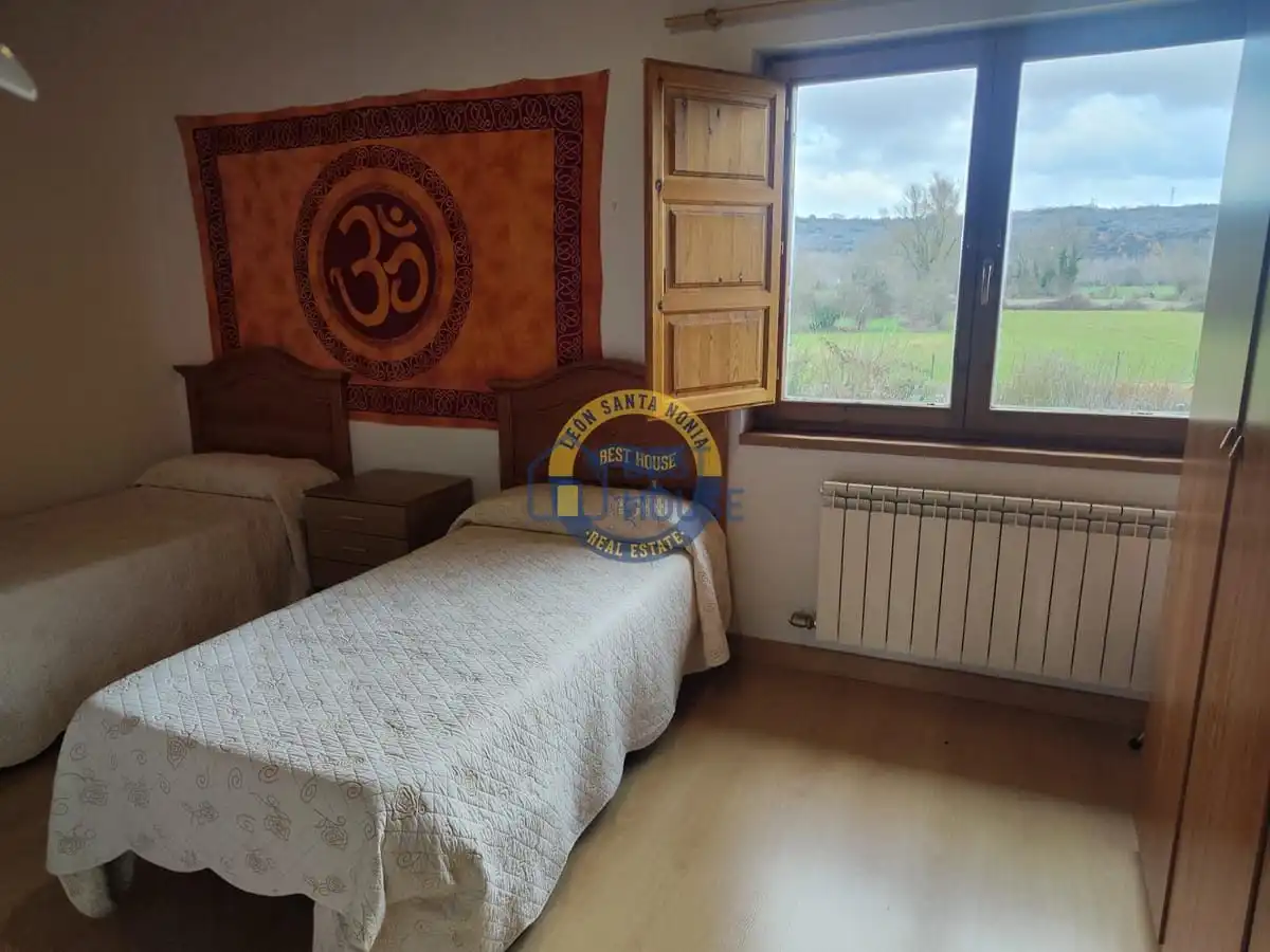Habitación de Casa o chalet en venta en Villaquilambre con Calefacción, Jardín privado y Parquet