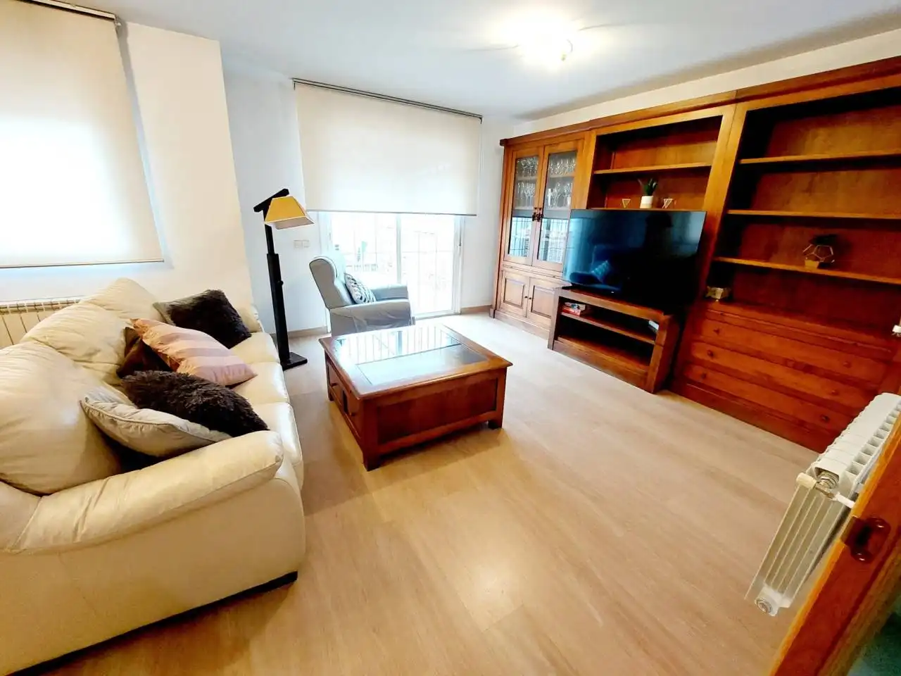 Sala de estar de Casa adosada en venta en Fuenlabrada con Aire acondicionado, Calefacción y Piscina comunitaria
