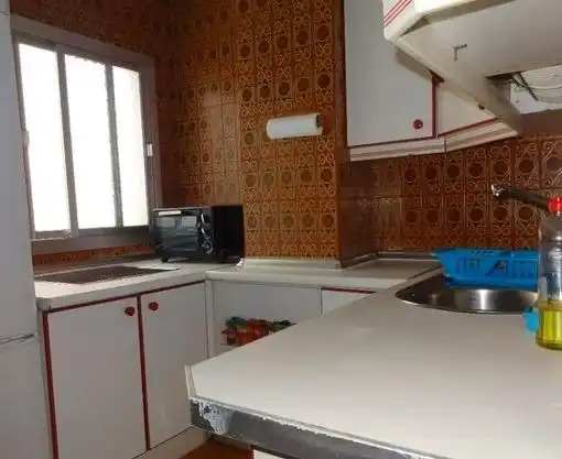 Kitchen of Flat for rent in Granada  with Heating, Terrace and Furnished