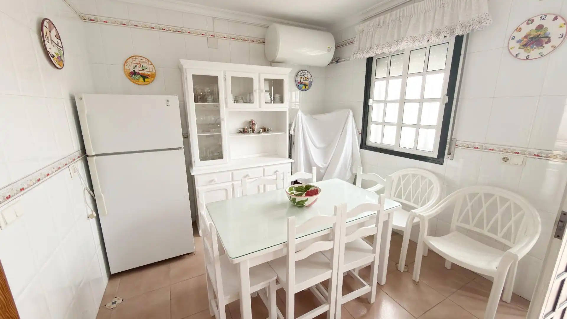 Cocina de Casa adosada de alquiler en Punta Umbría con Terraza y Piscina comunitaria
