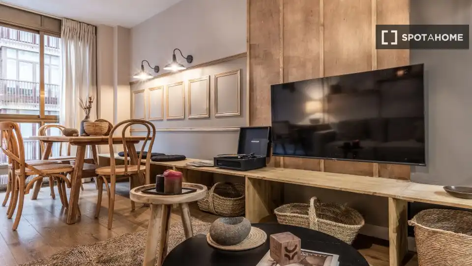 Sala de estar de Apartamento para compartir en Madrid con Aire acondicionado, Terraza y Amueblado