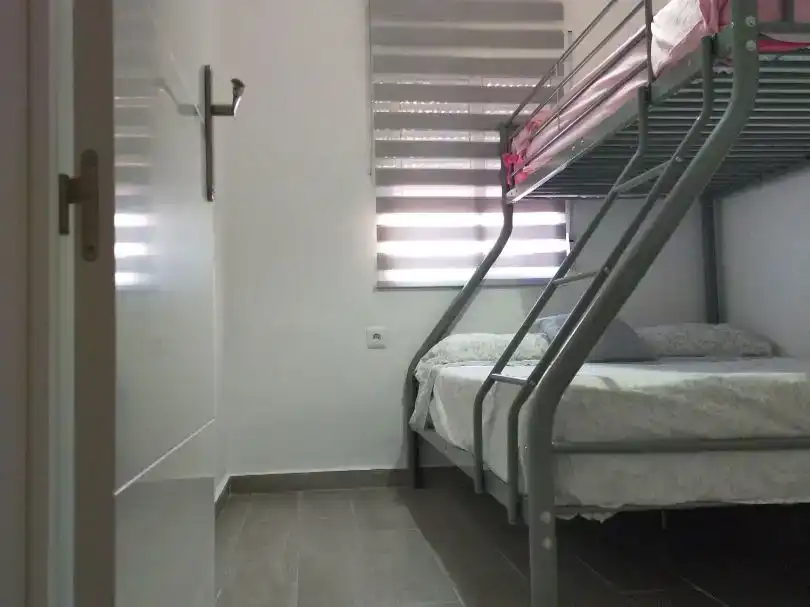 Dormitori de Casa adosada en venda en Chipiona amb Aire condicionat, Moblat i Balcó