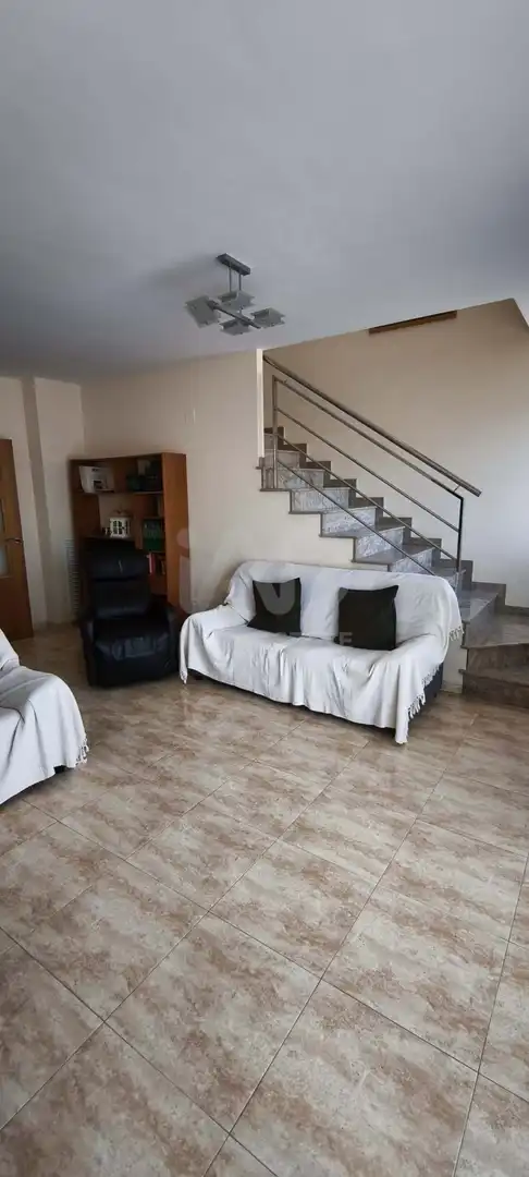 Sala d'estar de Casa adosada en venda en L'Aldea amb Aire condicionat, Calefacció i Terrassa