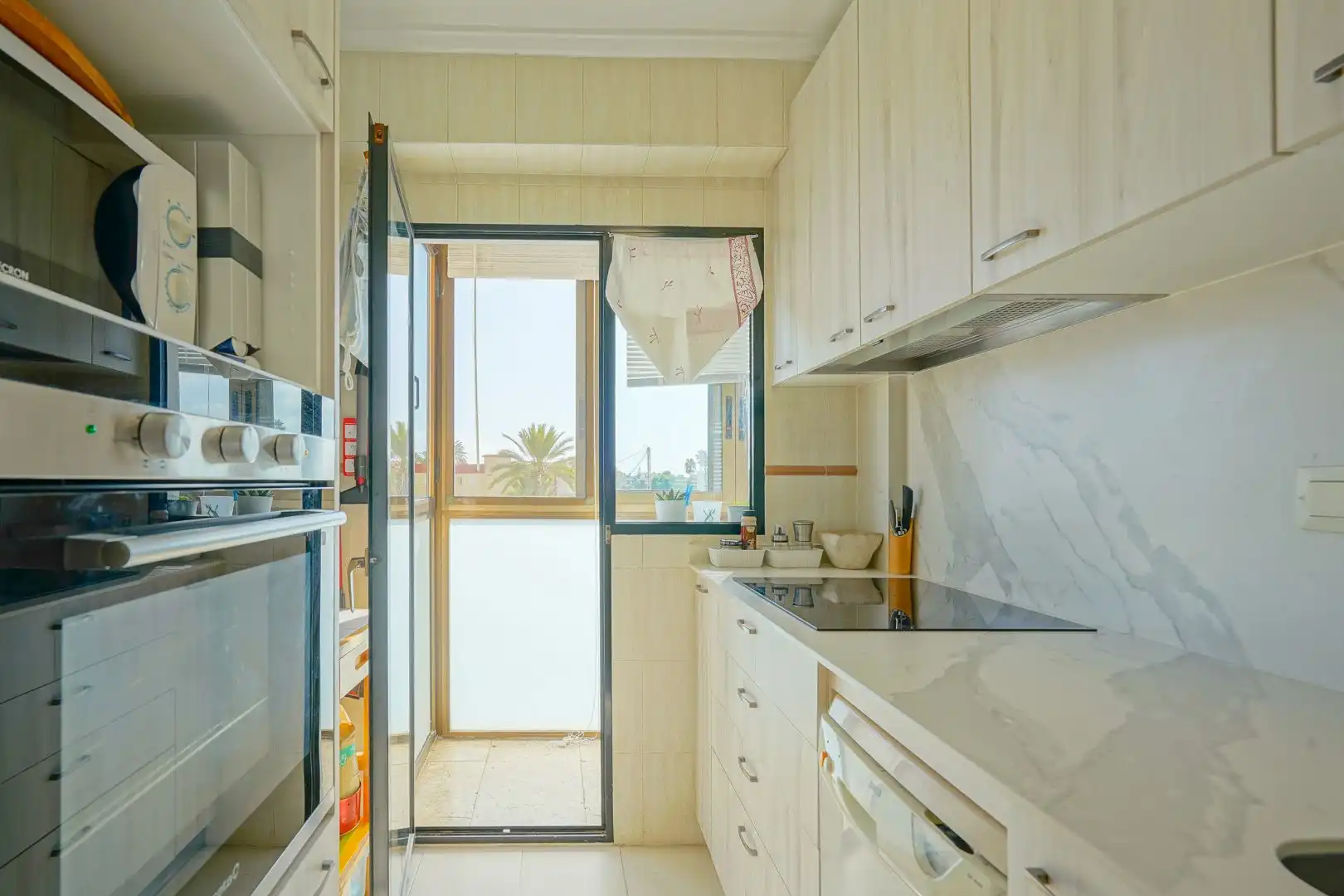 Cuina de Apartament en venda en Dénia amb Aire condicionat, Terrassa i Piscina