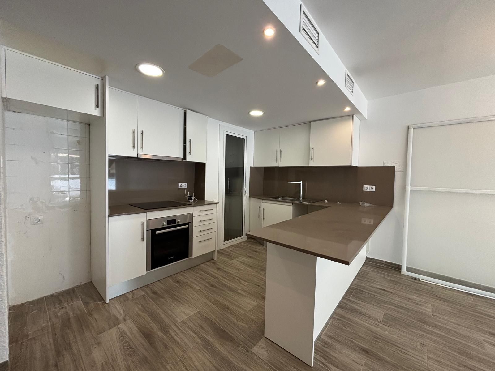 Kitchen of Planta baja for sale in Vilanova i la Geltrú  with Air Conditioner, Private garden and Terrace