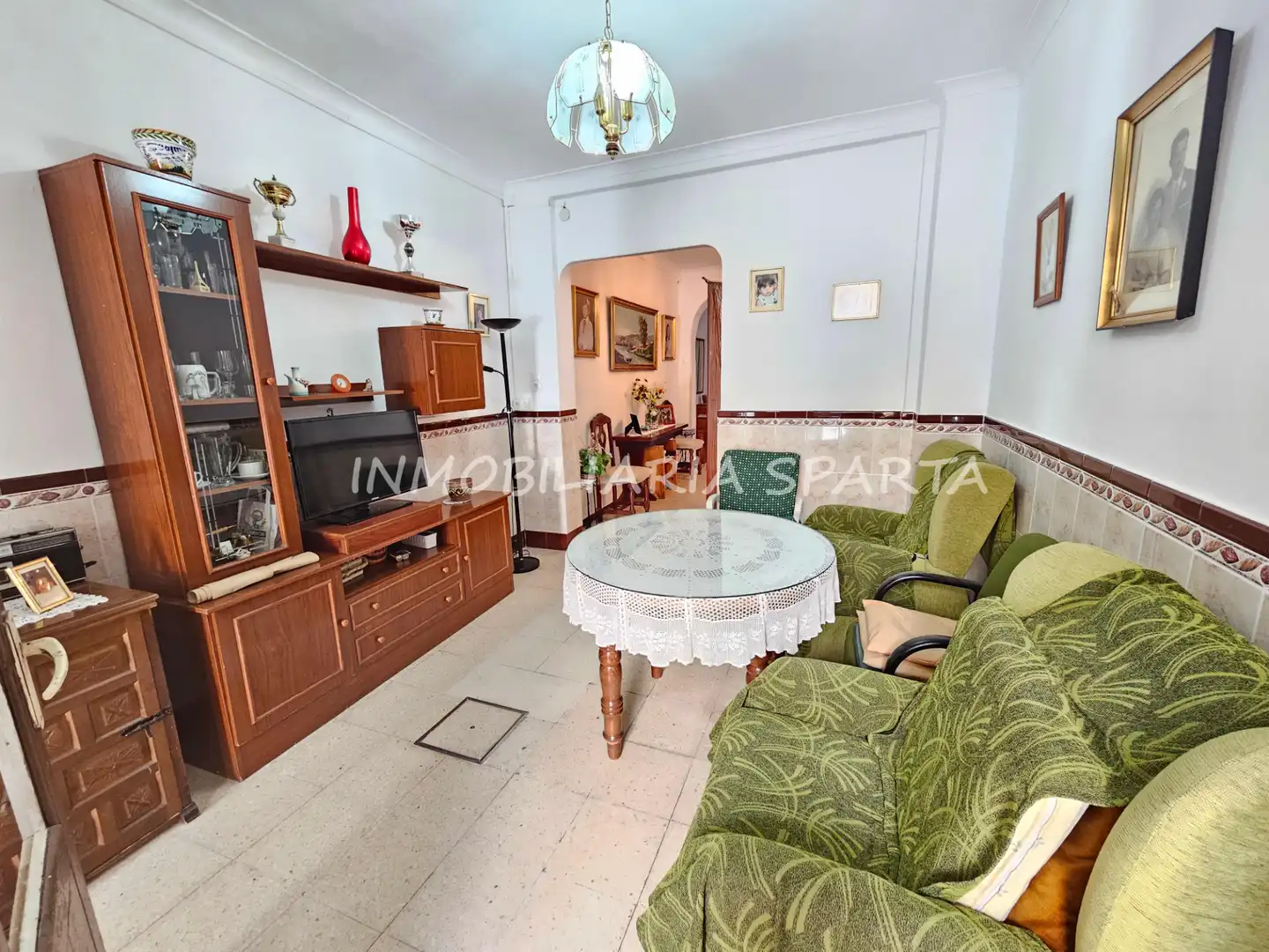 Sala de estar de Casa adosada en venta en Santiponce con Terraza, Trastero y Balcón