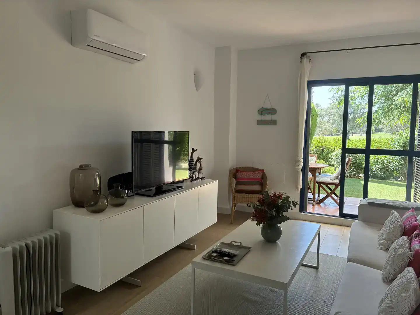 Sala de estar de Dúplex de alquiler en Rota con Aire acondicionado, Jardín privado y Piscina