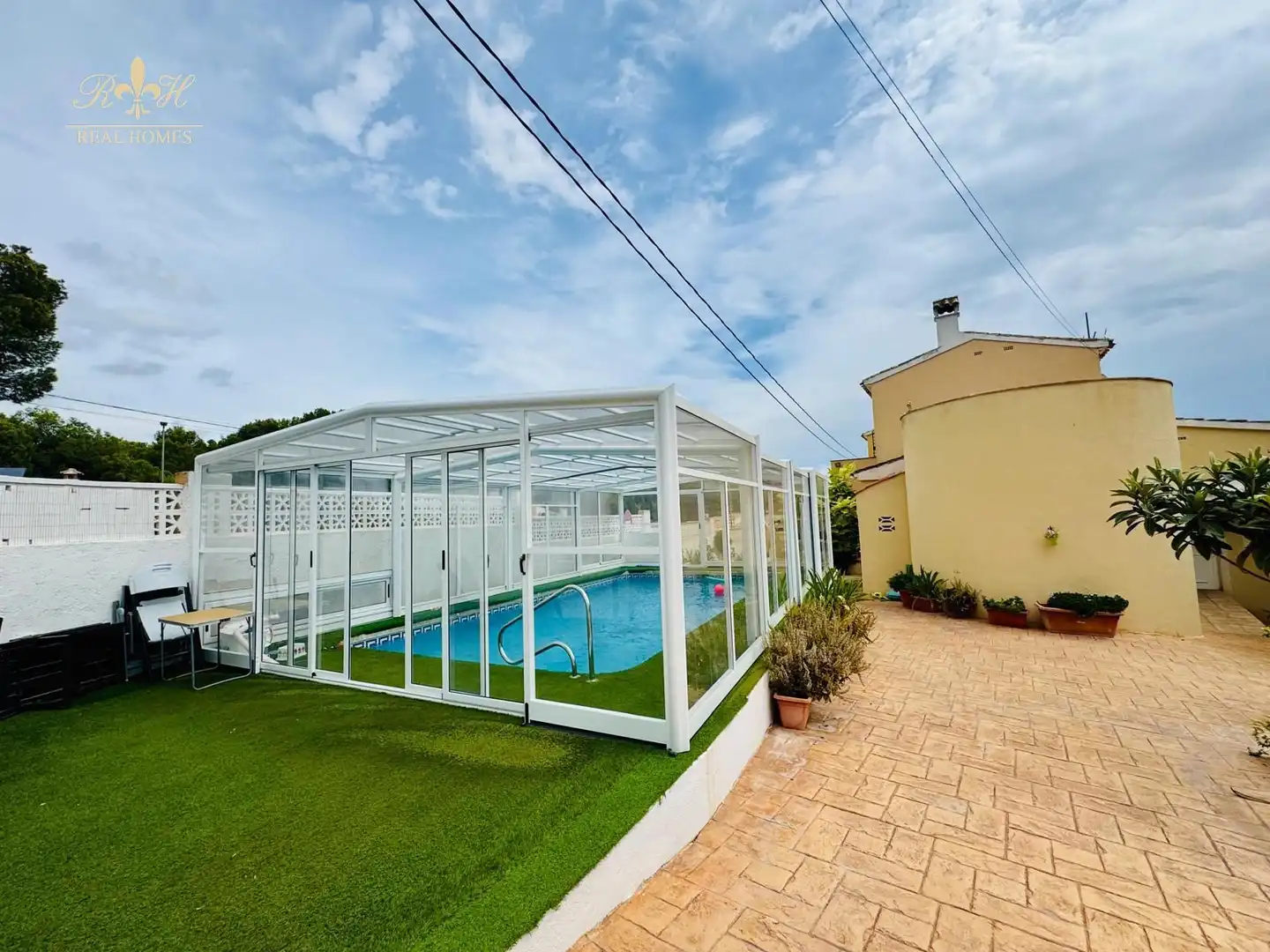 Schwimmbecken von Einfamilien-Reihenhaus zum Verkauf in L'Alfàs del Pi mit Klimaanlage, Terrasse und Schwimmbad