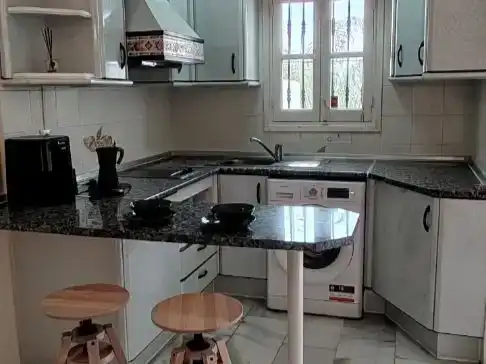 Kitchen of Flat for sale in Mijas  with Air Conditioner, Terrace and Swimming Pool