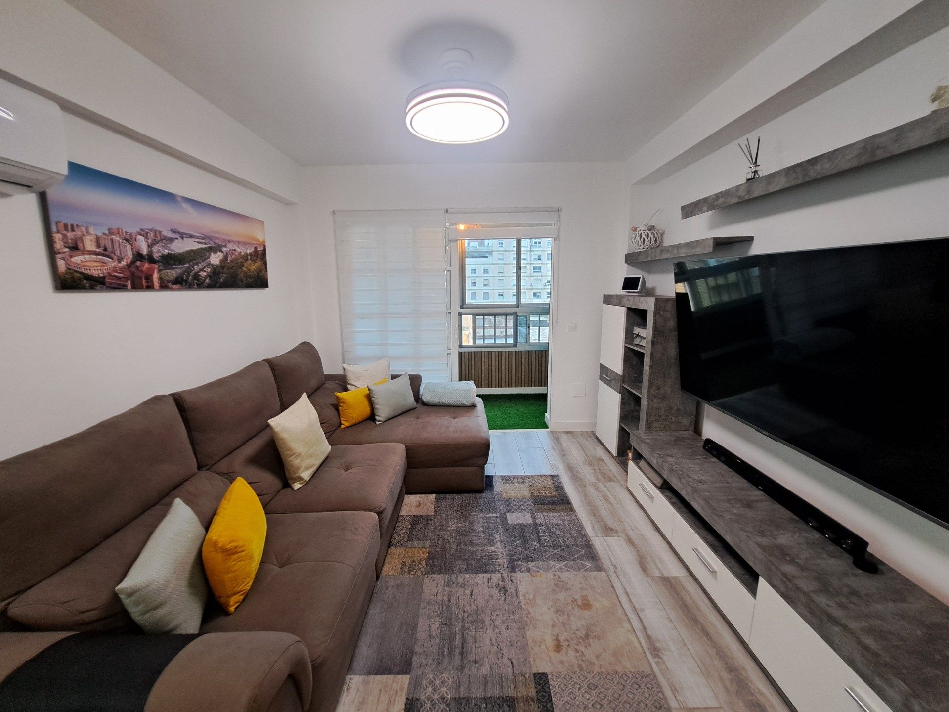 Sala d'estar de Pis de lloguer en Málaga Capital amb Aire condicionat i Terrassa