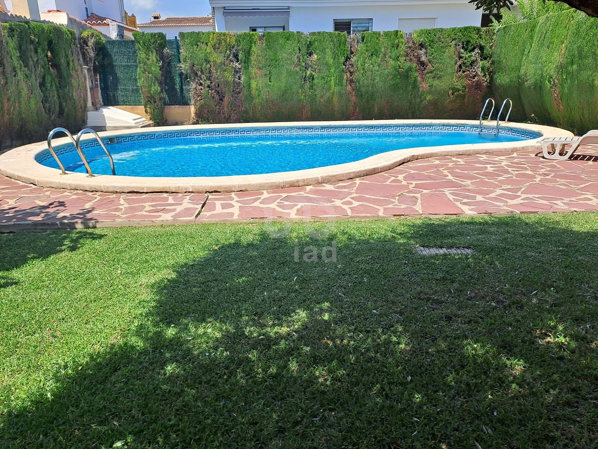 Swimming pool of House or chalet for sale in Gandia  with Air Conditioner, Heating and Terrace