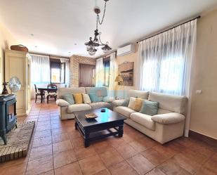 Sala d'estar de Casa adosada en venda en Mazagón amb Aire condicionat, Terrassa i Balcó
