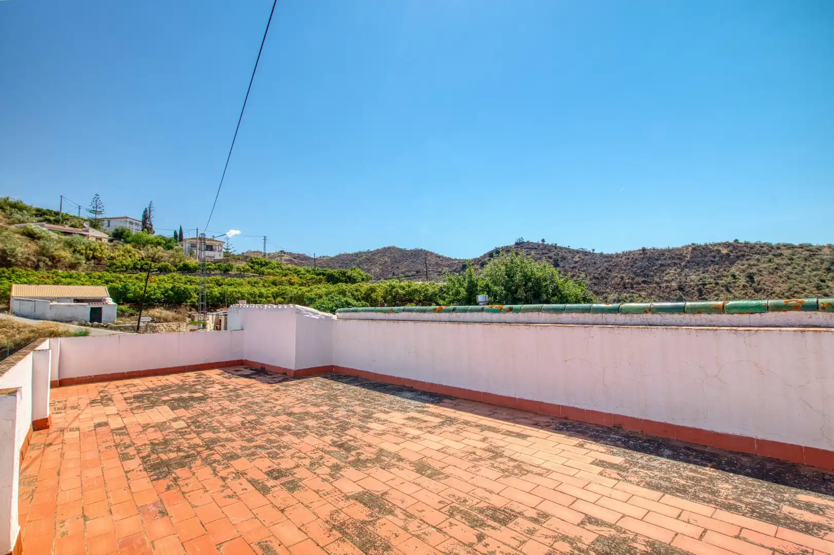 Terrassa de Casa adosada en venda en Canillas de Aceituno amb Jardí privat