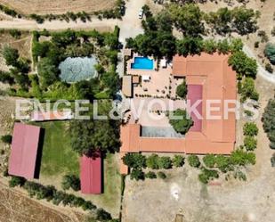 Exterior view of Country house for sale in Villaviciosa de Odón  with Private garden and Swimming Pool