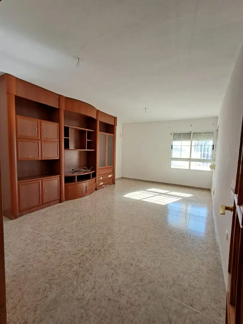 Sala de estar de Casa adosada en venta en Roquetas de Mar con Terraza y Piscina comunitaria