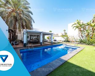 Exterior view of House or chalet for sale in Roquetas de Mar  with Air Conditioner, Private garden and Parquet flooring