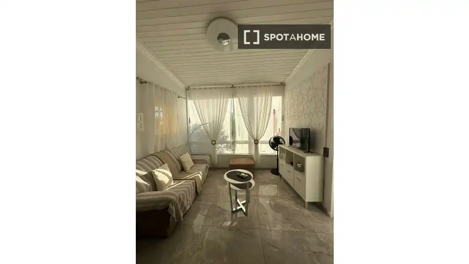 Sala de estar de Apartamento para compartir en Pájara con Aire acondicionado, Terraza y Amueblado