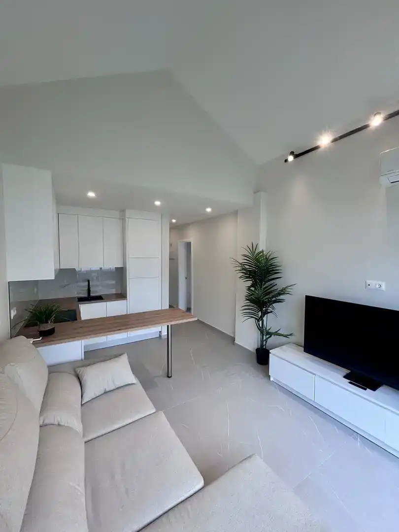 Sala de estar de Piso de alquiler en Adeje con Aire acondicionado, Jardín privado y Piscina