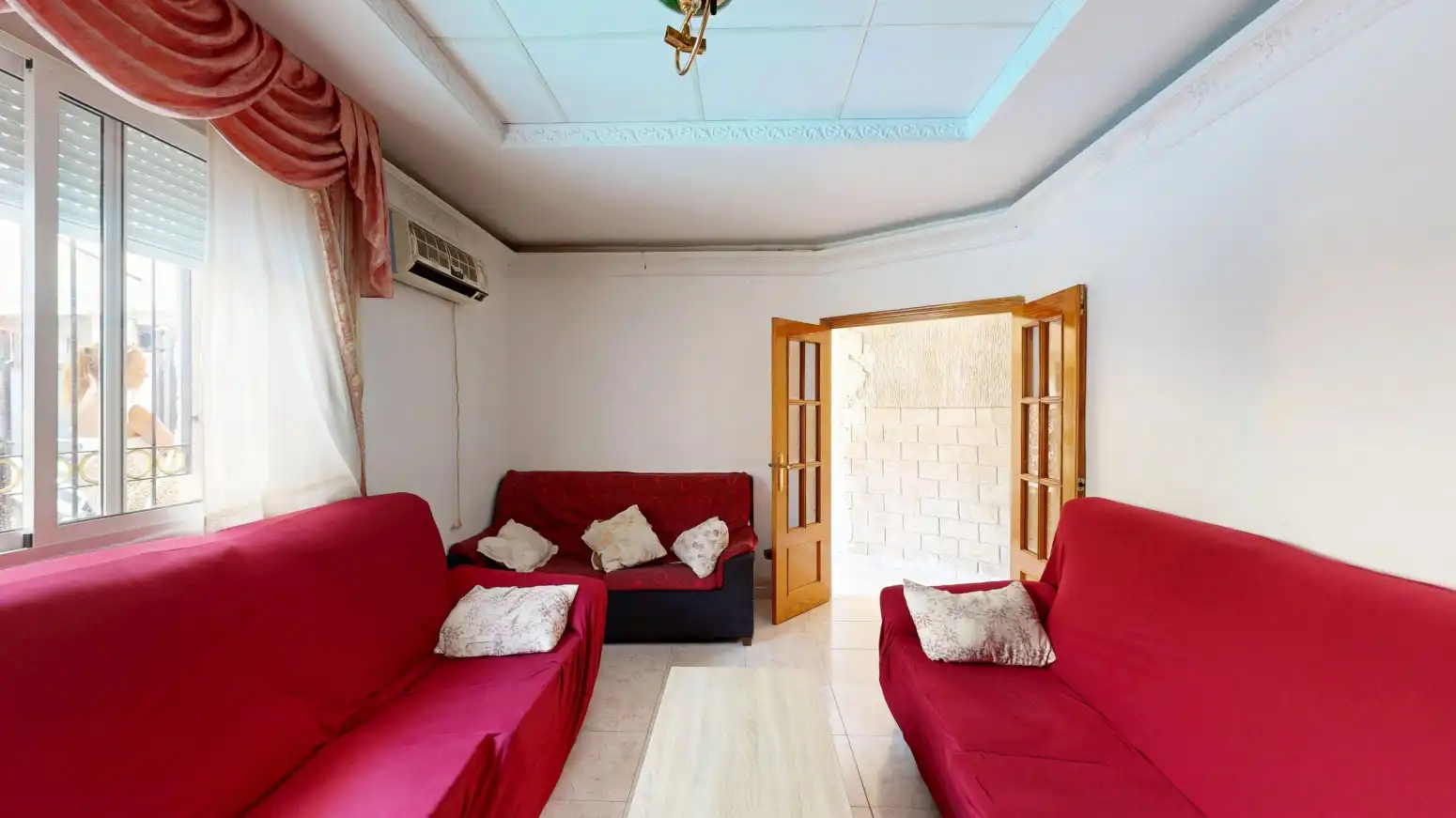 Sala d'estar de Casa adosada en venda en Cartagena amb Aire condicionat i Jardí privat