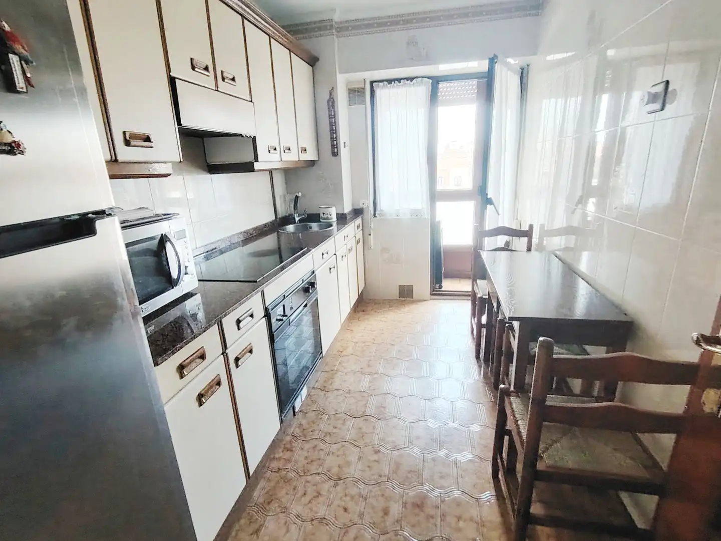 Kitchen of Flat for sale in Gijón   with Heating, Parquet flooring and Storage room