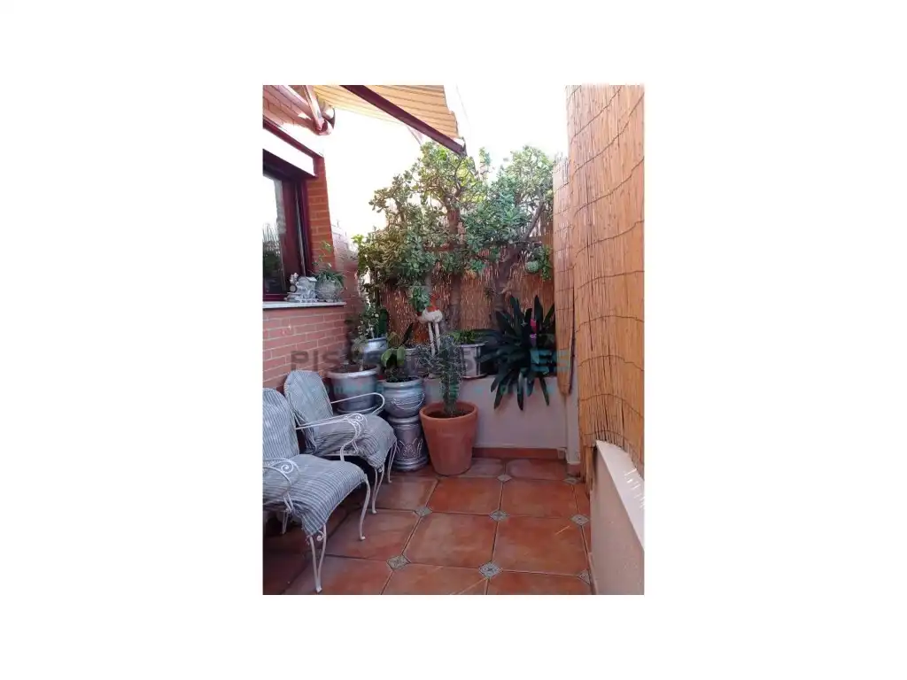 Terrassa de Casa adosada en venda en Sagunto / Sagunt amb Aire condicionat, Jardí privat i Terrassa