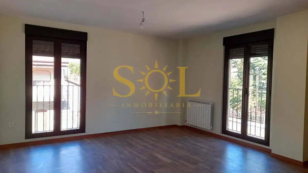 Sala de estar de Dúplex en venta en Puebla de Lillo con Calefacción, Parquet y Terraza
