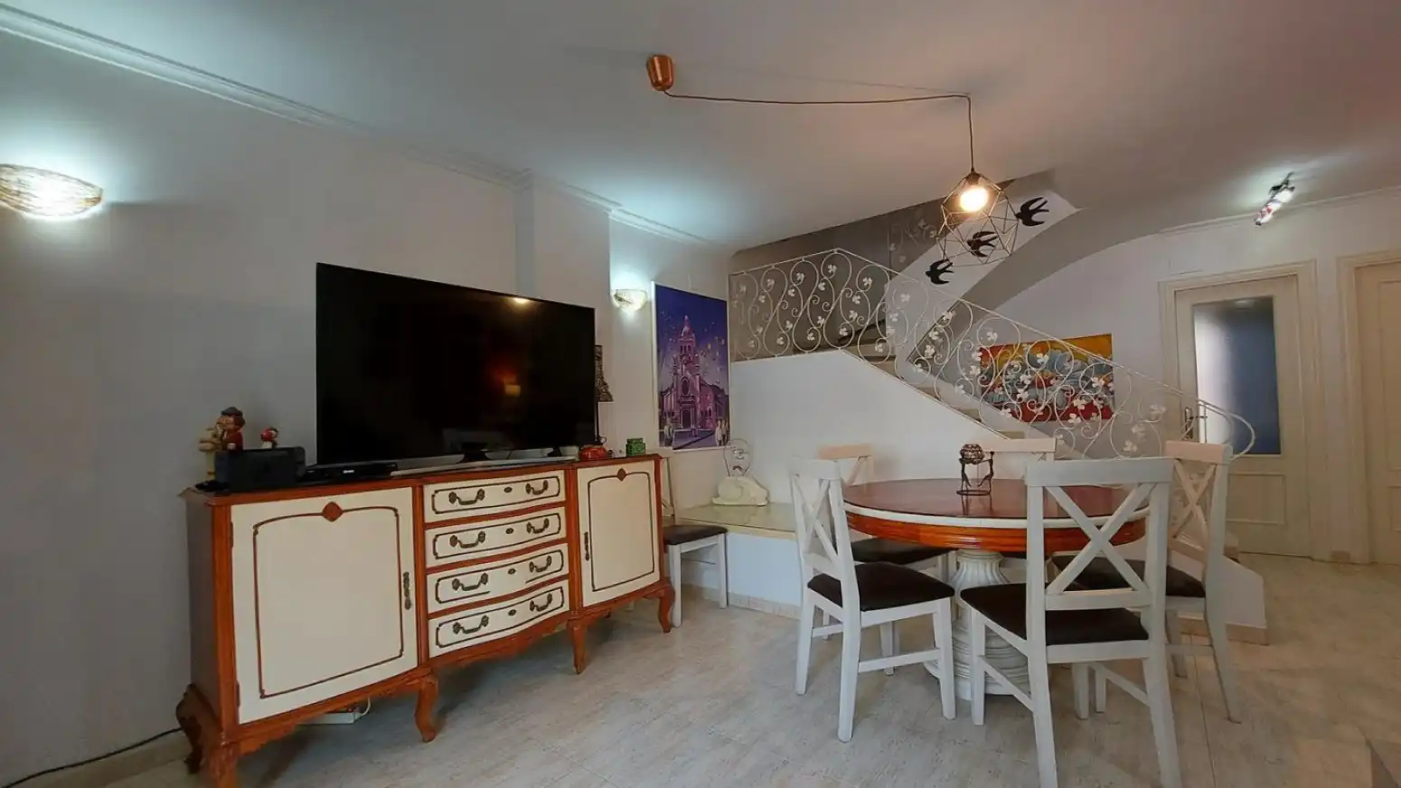 Sala d'estar de Casa adosada en venda en Sagunto / Sagunt amb Calefacció i Terrassa