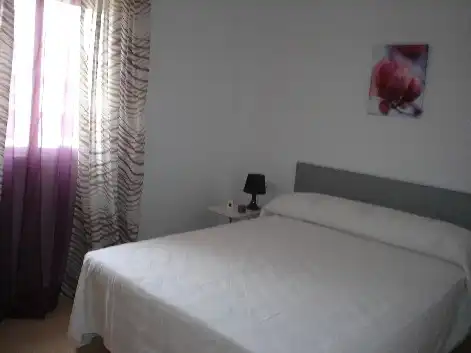 Schlafzimmer von Dachboden zur Miete in Xeraco mit Terrasse, Möbliert und Ofen