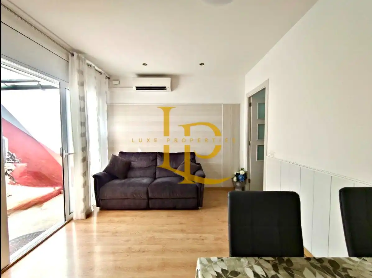 Sala d'estar de Casa o xalet en venda en Sabadell amb Aire condicionat, Parquet i Terrassa