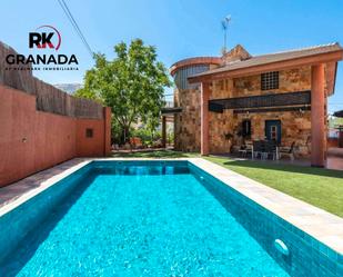 Swimming pool of House or chalet for sale in Pinos Genil  with Air Conditioner, Heating and Terrace