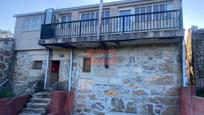 Vista exterior de Casa o xalet en venda en A Cañiza   amb Calefacció, Jardí privat i Balcó