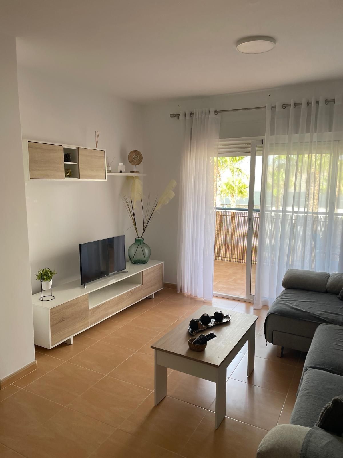 Living room of Flat to rent in Águilas  with Air Conditioner, Private garden and Swimming Pool