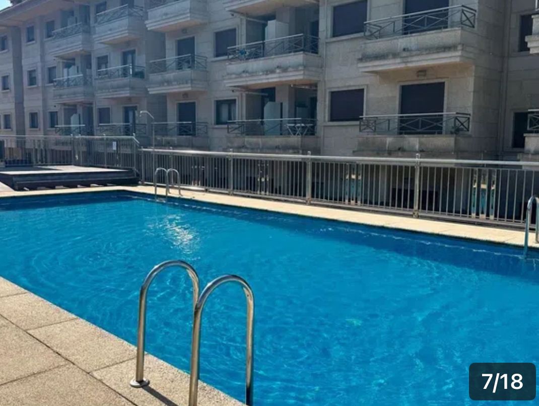 Swimming pool of Apartment for sale in Sanxenxo  with Heating, Terrace and Storage room