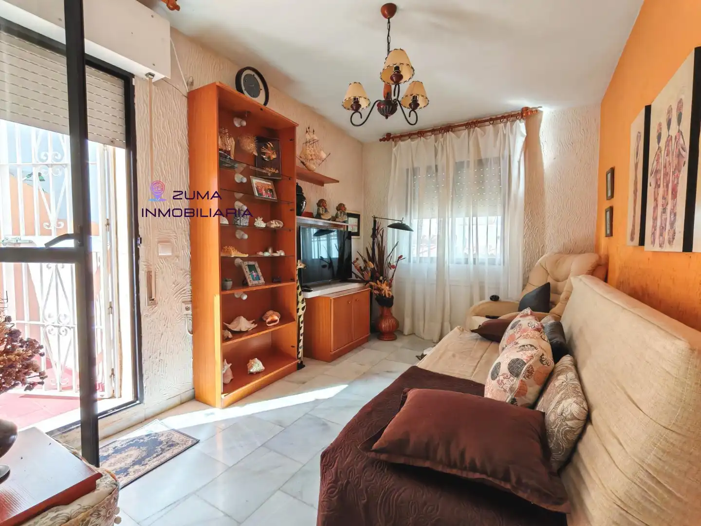 Sala de estar de Casa adosada en venta en Churriana